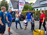 20220904_181643L_Abschlussbesprechnung_Helfer_SV_Lützel_und_Jana Westhauser (rotes Shirt)